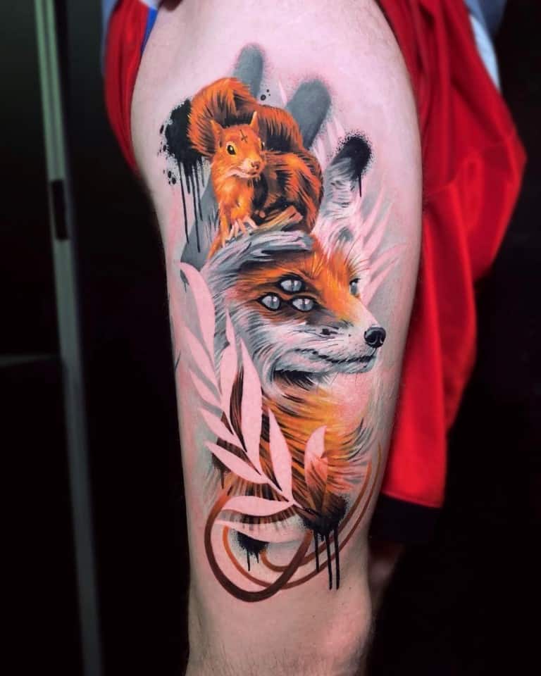 Surrealistic leg tattoo of a fox and a squirrel, withe negative spaces in combination with color and black and grey