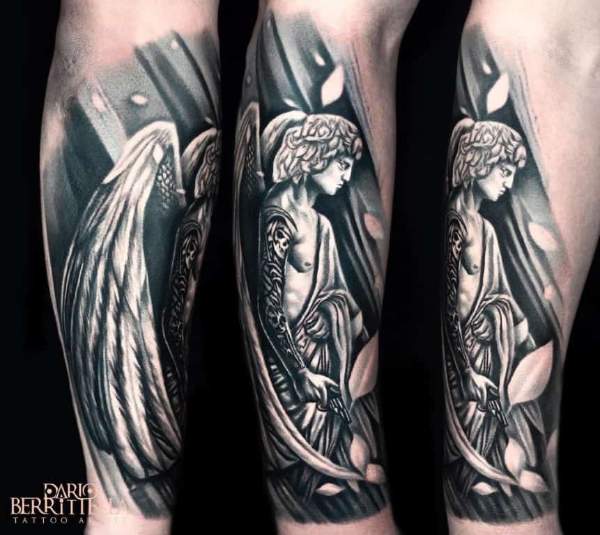 Black and grey realism tattoo of a man with wings and a tattoo sleeve holding a gun