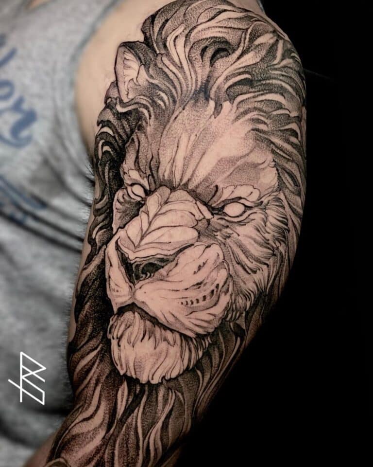 Angry lion tattoo