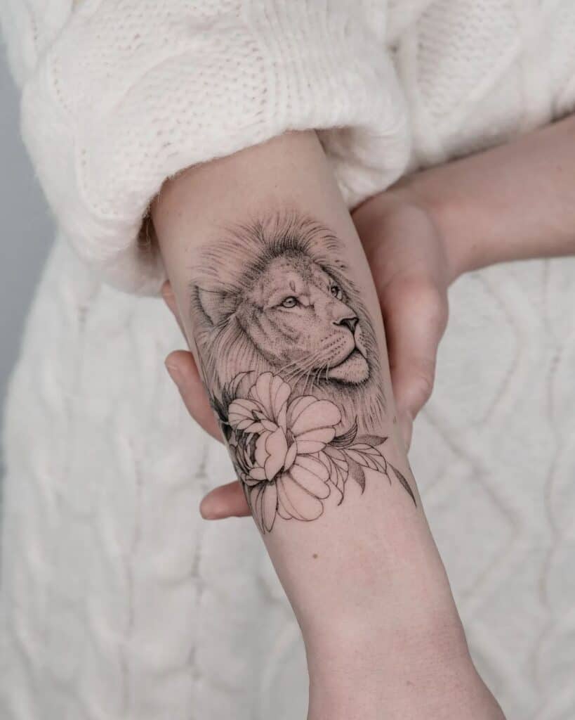 lion with flower tattoo