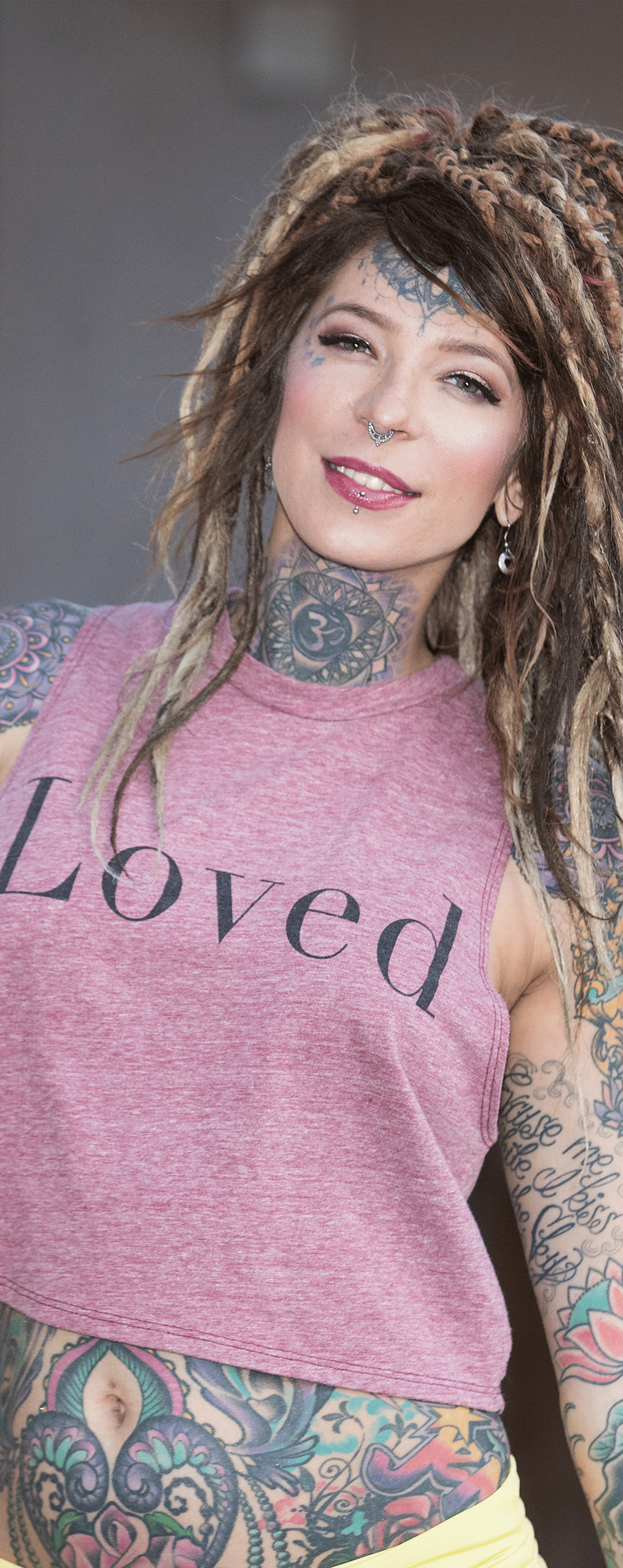 tattoo artist with loved shirt