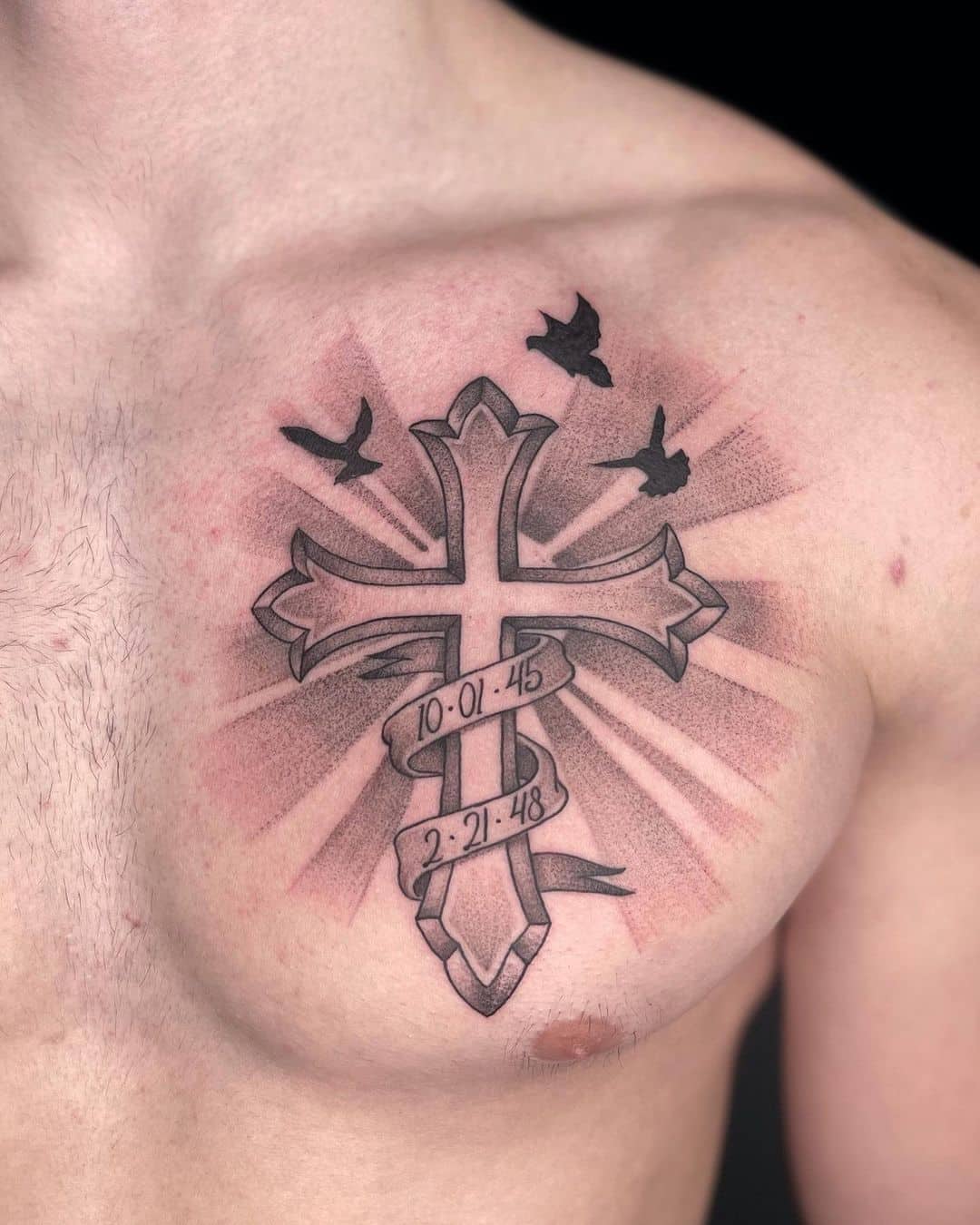 cross tattoo on chest