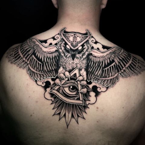 intricate owl tattoo with mandala and star elements on Craiyon