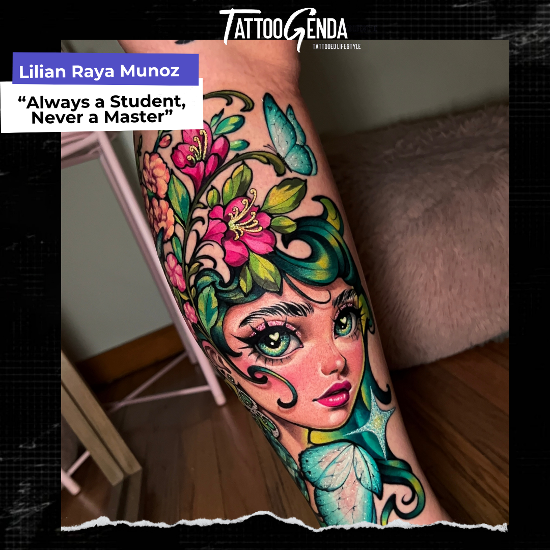 A vibrant leg tattoo by Lilian Raya Munoz, captioned “Always a Student, Never a Master,” showcases a stylized female face with green hair, pink eyes, and vivid flowers and butterflies gracefully woven around her.
